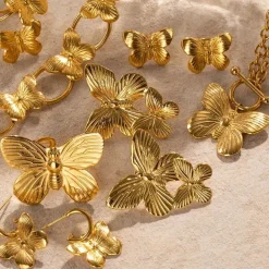 Anna K Jewelry - Örhängen Fashion Butterfly Stud Guld