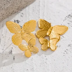 Anna K Jewelry - Örhängen Fashion Butterflys Guld