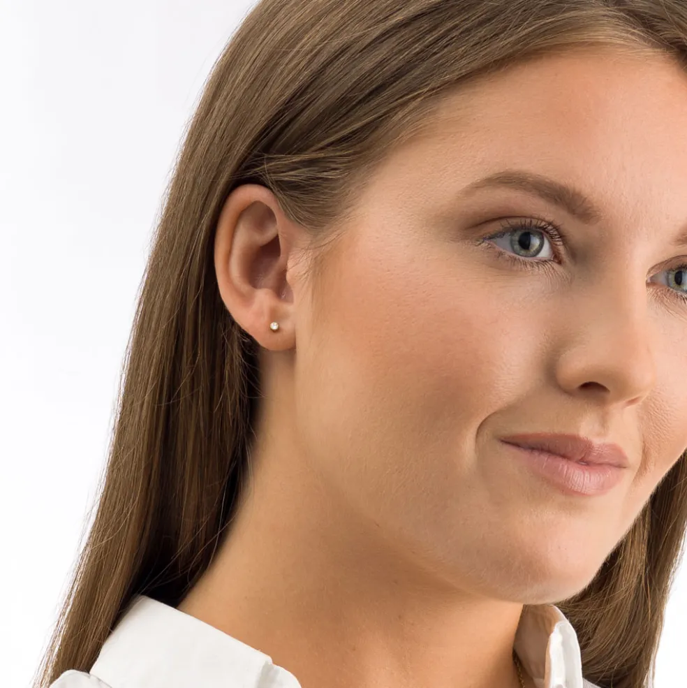 Blomdahl - Örhängen Bezel Titan Guld Klar