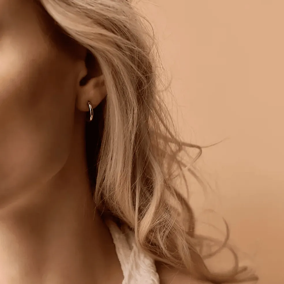 Blomdahl - Örhängen Titan Round Curved Guld